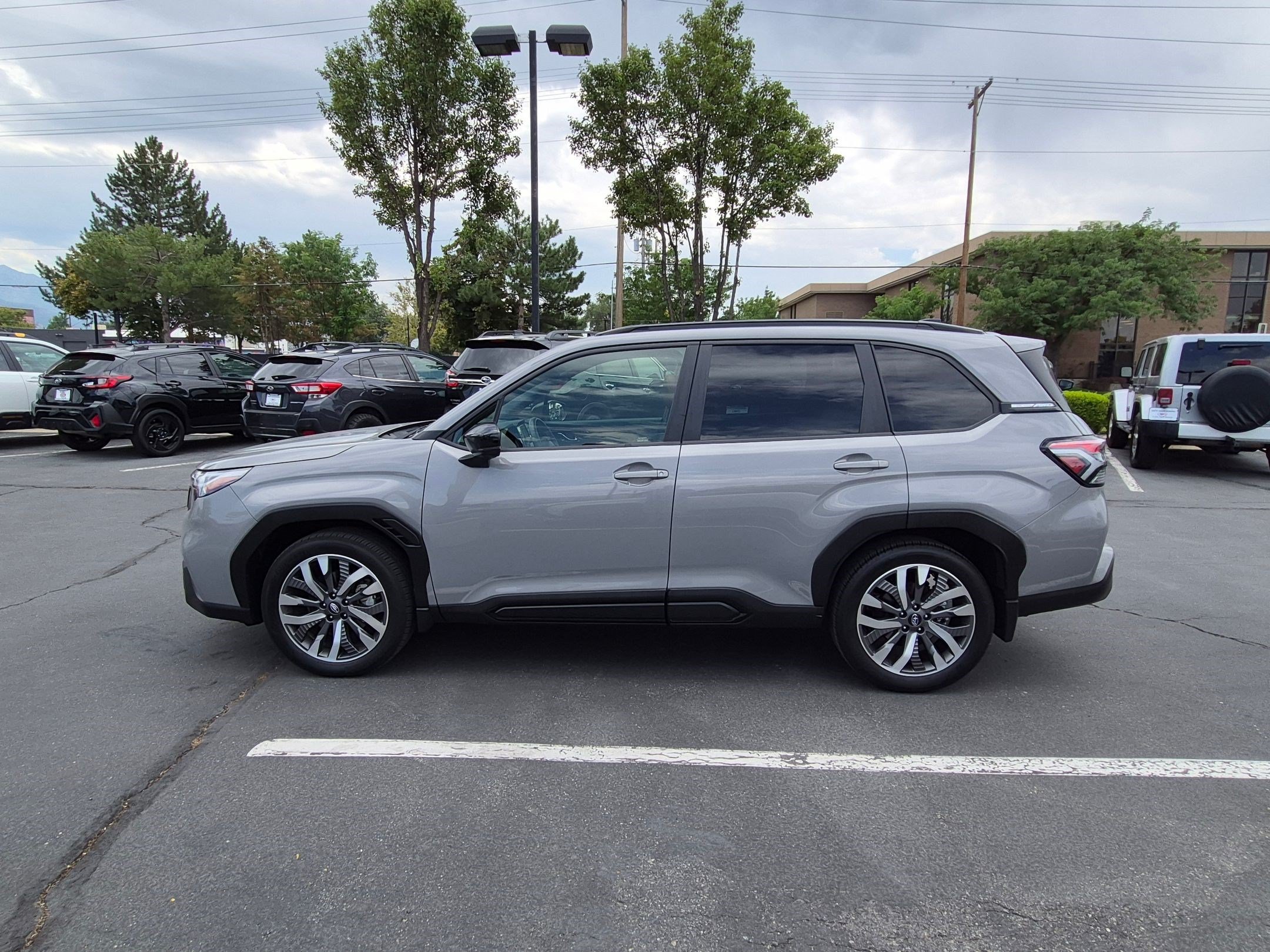 Certified Used 2025 River Rock Pearl Subaru Touring image 7