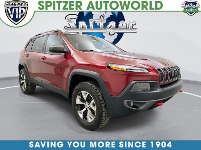 Used 2015 Red Jeep Trailhawk image 1