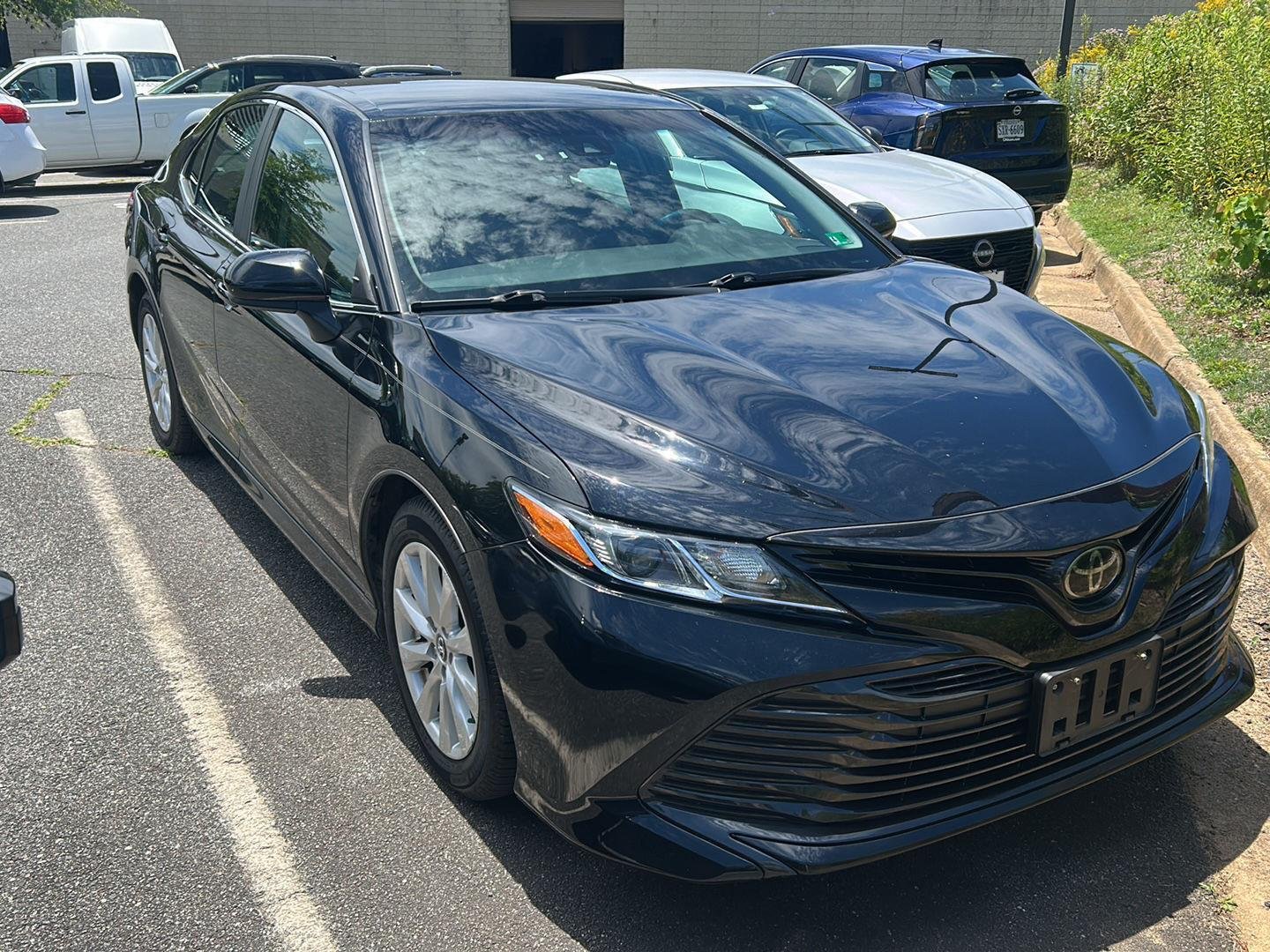 Used 2020 Midnight Black Metallic Toyota LE image 4