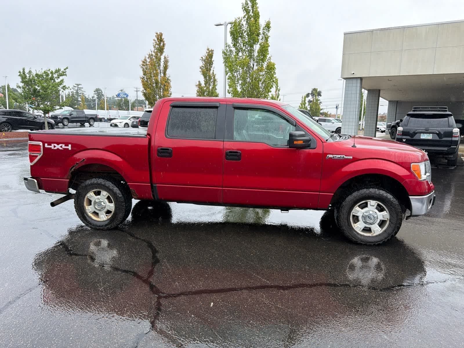 Used 2013 Ruby Red Tinted Clearcoat Metallic Ford XLT image 6