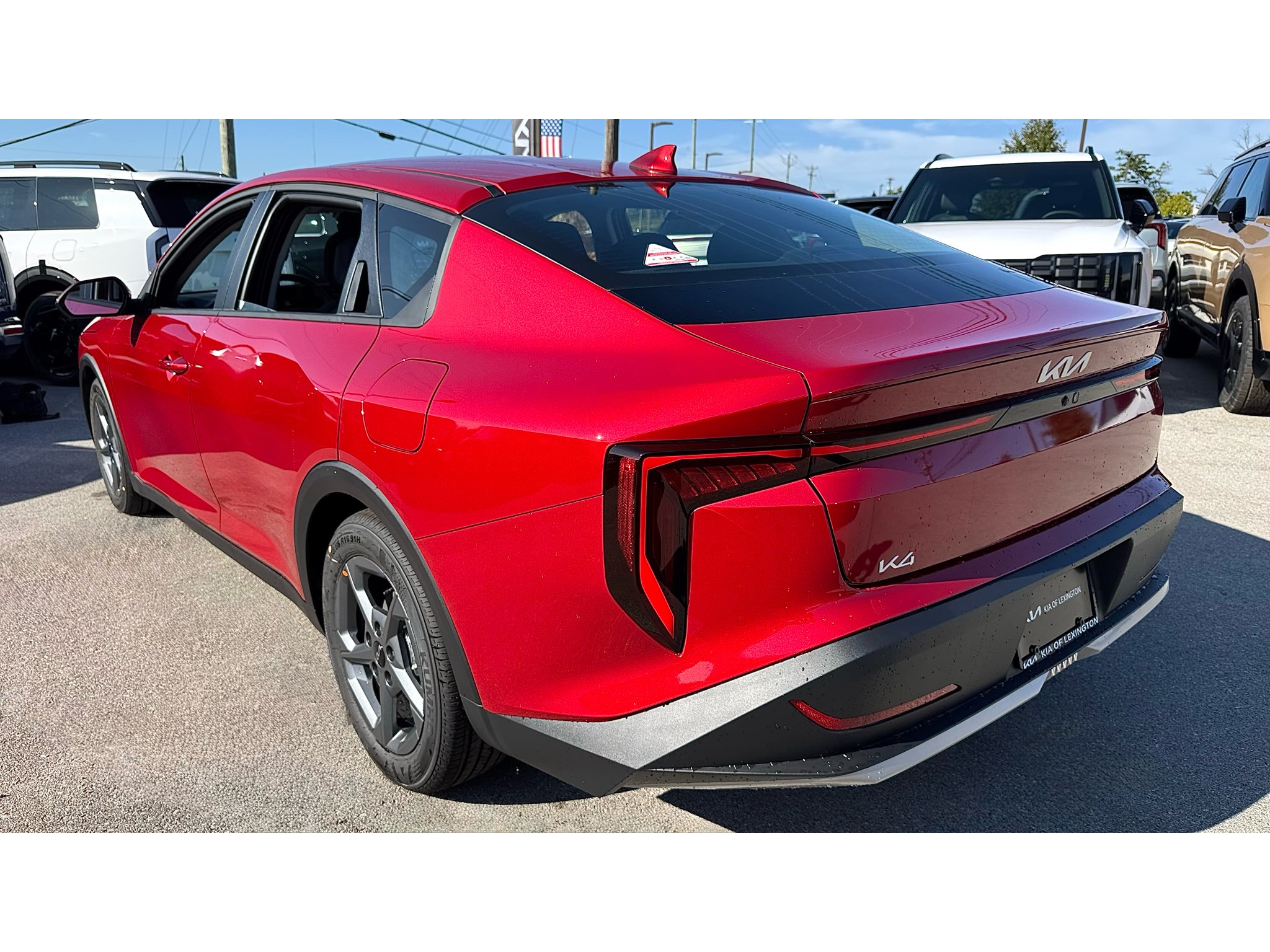 New 2026 Currant Red Kia LXS image 25