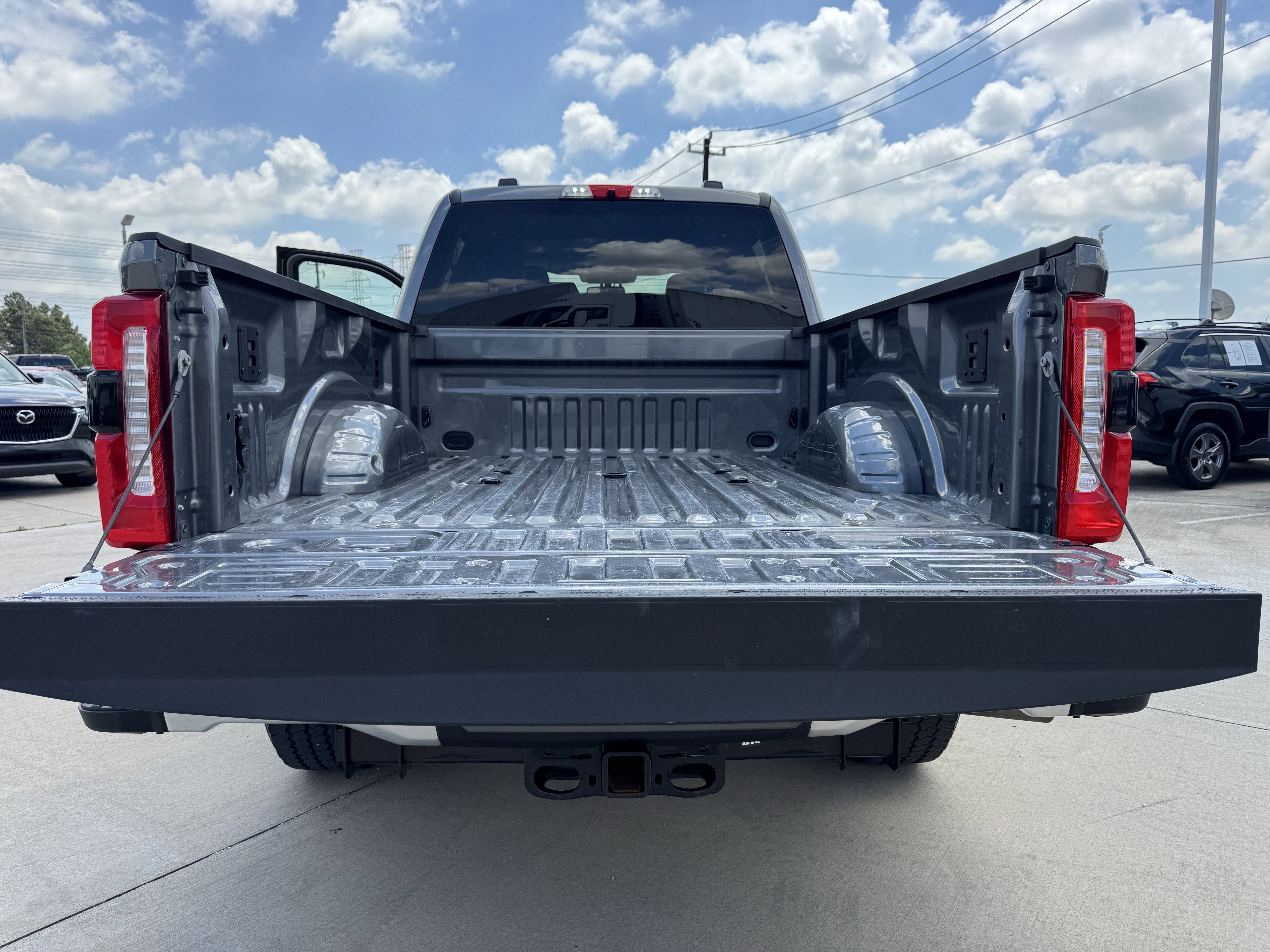 Used 2025 Gray Metallic Ford LARIAT 4WD Crew Cab 6.75