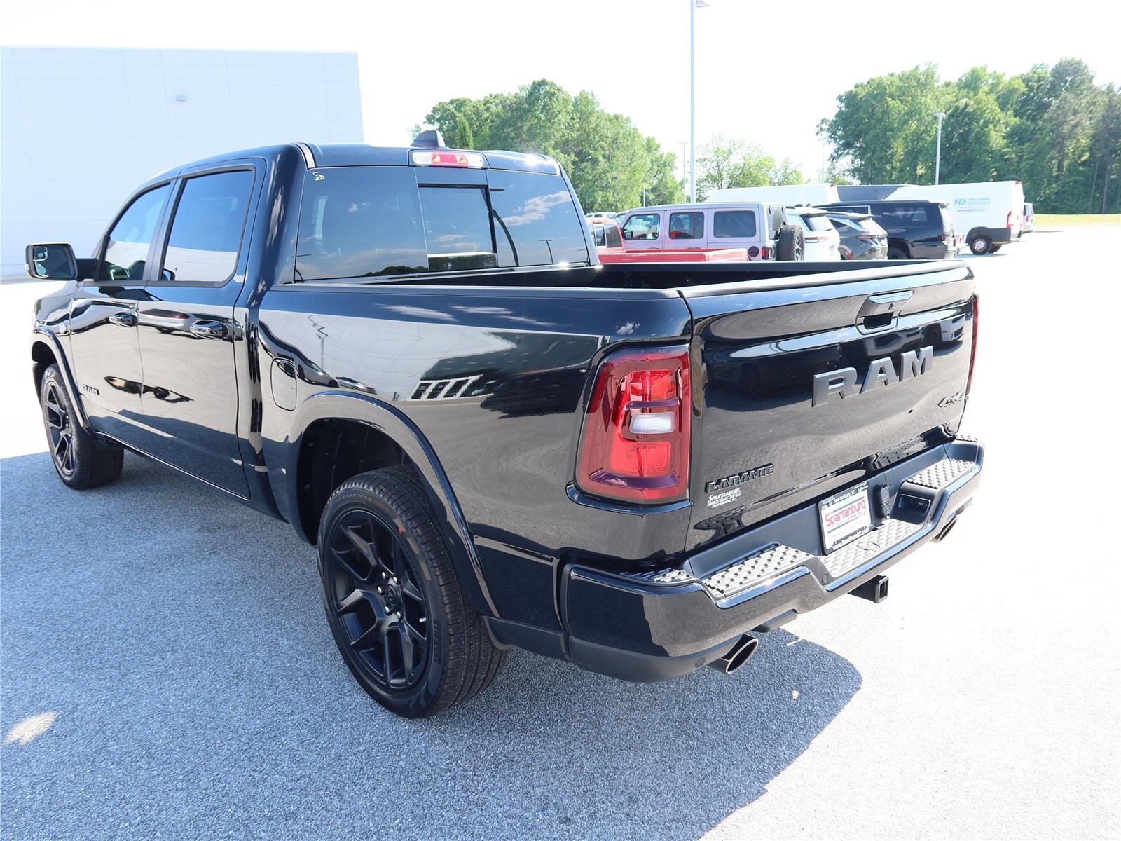 New 2026 Diamond Black Crystal Pearl-Coat Exterior Paint RAM Laramie image 4