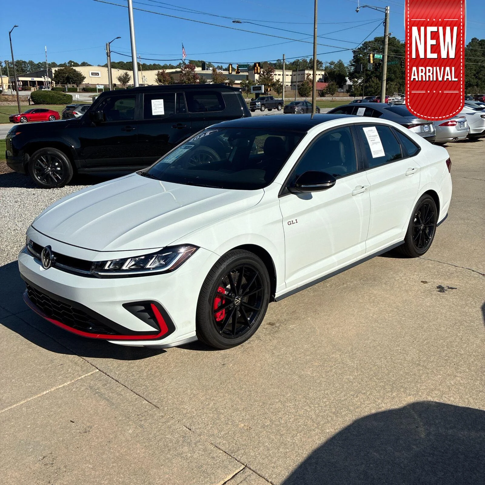 Used 2025 Pure White w/Deep Black Roof Volkswagen Autobahn image 1
