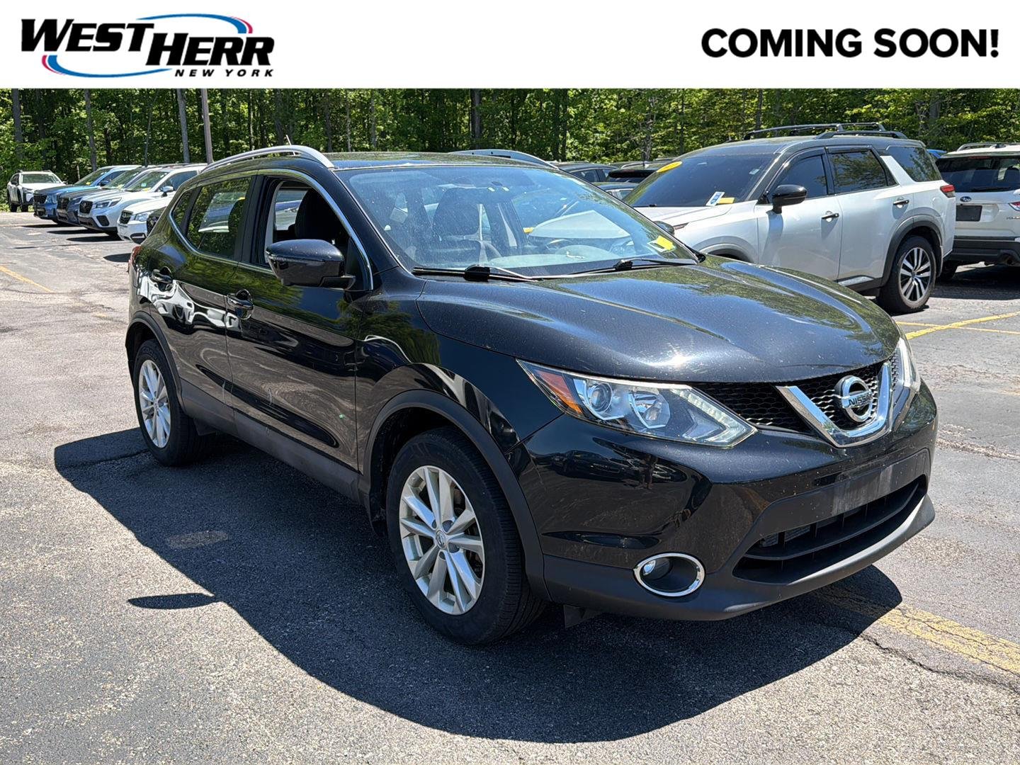 Used 2017 Magnetic Black Nissan SV image 1