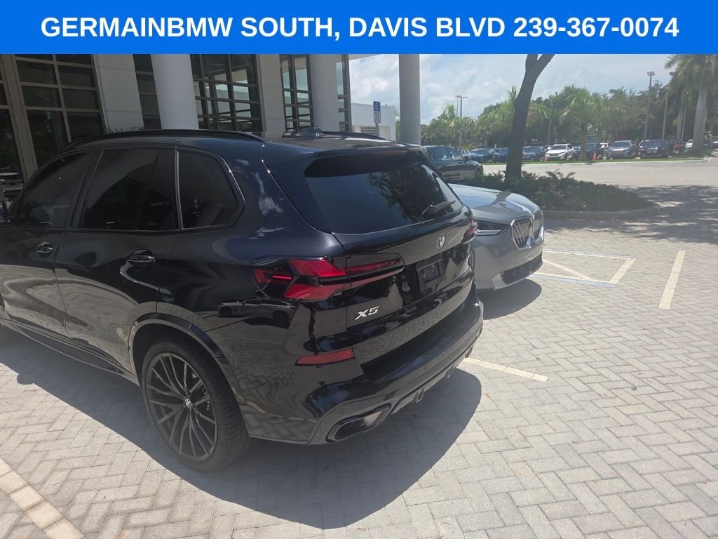 Certified Used 2026 Black Sapphire Metallic BMW sDrive40i image 12