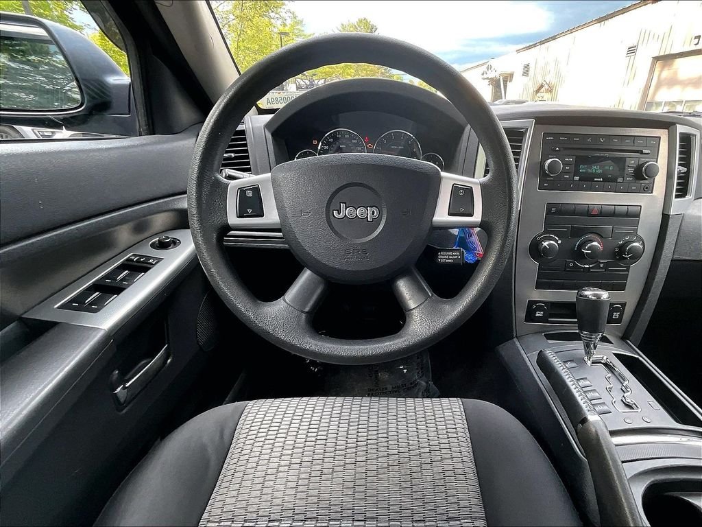 Used 2009 Modern Blue Pearlcoat Jeep Laredo image 17