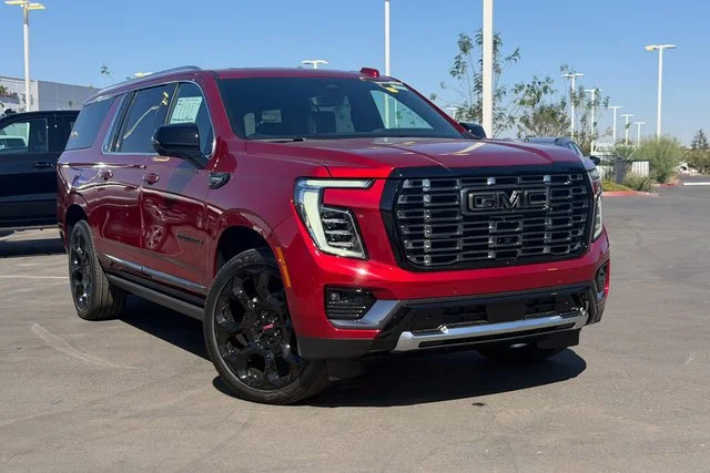 New 2026 Volcanic Red Tintcoat GMC Denali Ultimate image 1