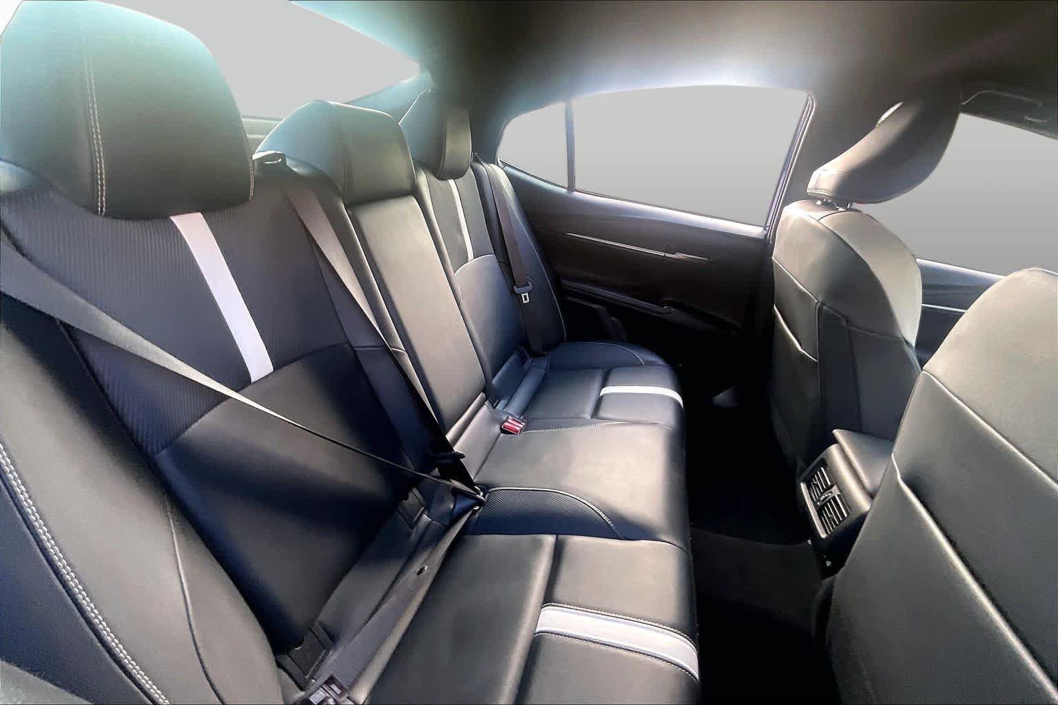 Used 2025 Reservoir Blue Toyota SE image 19