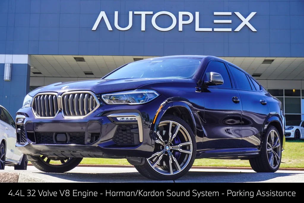 Used 2020 Black BMW M50i image 1