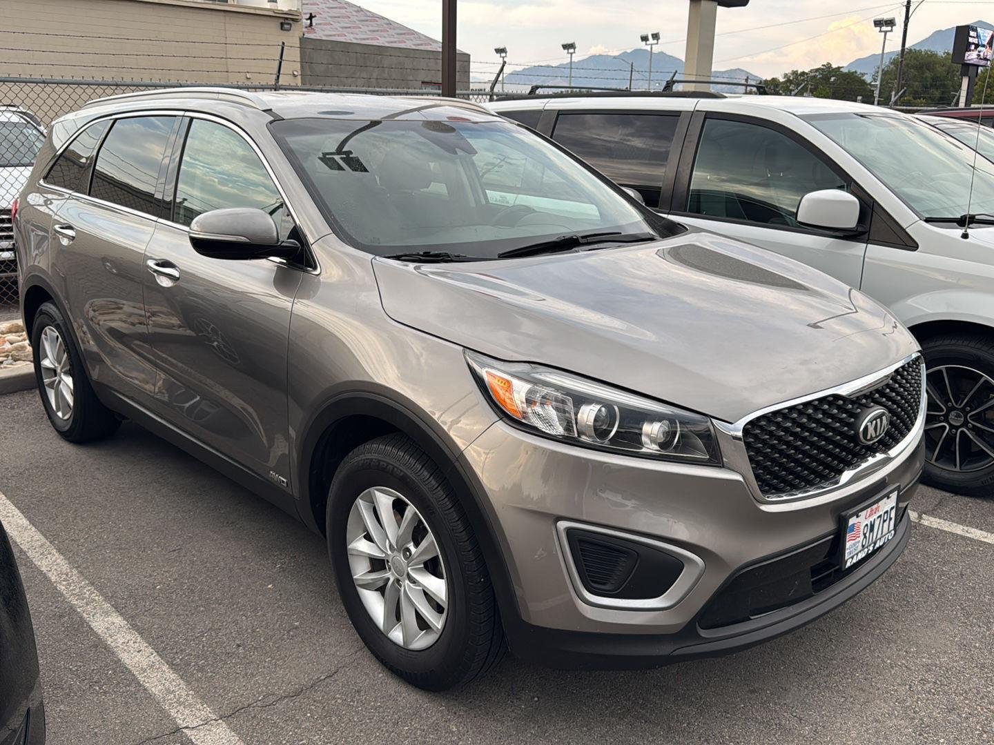 Used 2018 Titanium Silver Kia LX image 1