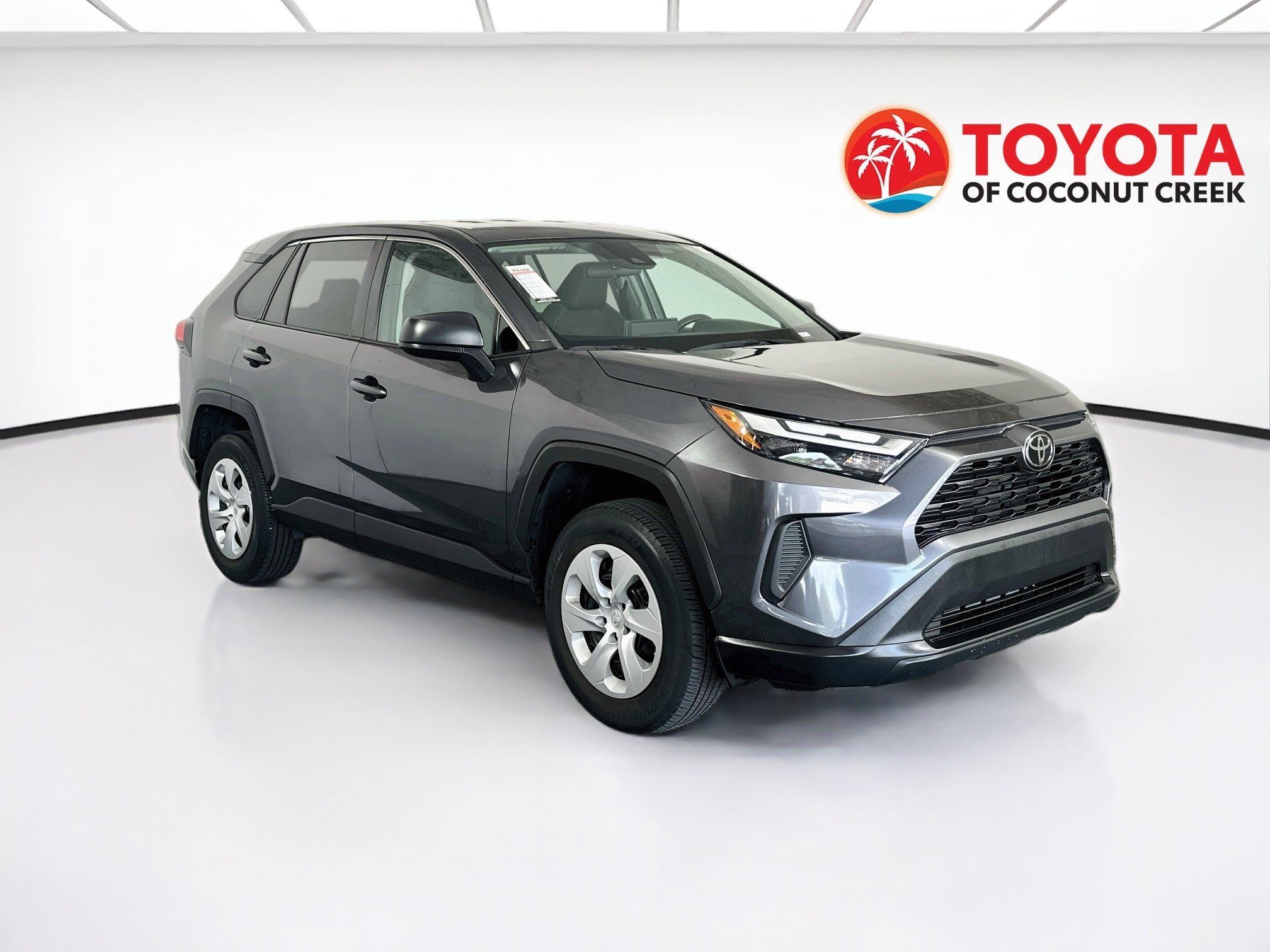 Used 2024 Magnetic Gray Metallic Toyota LE image 1