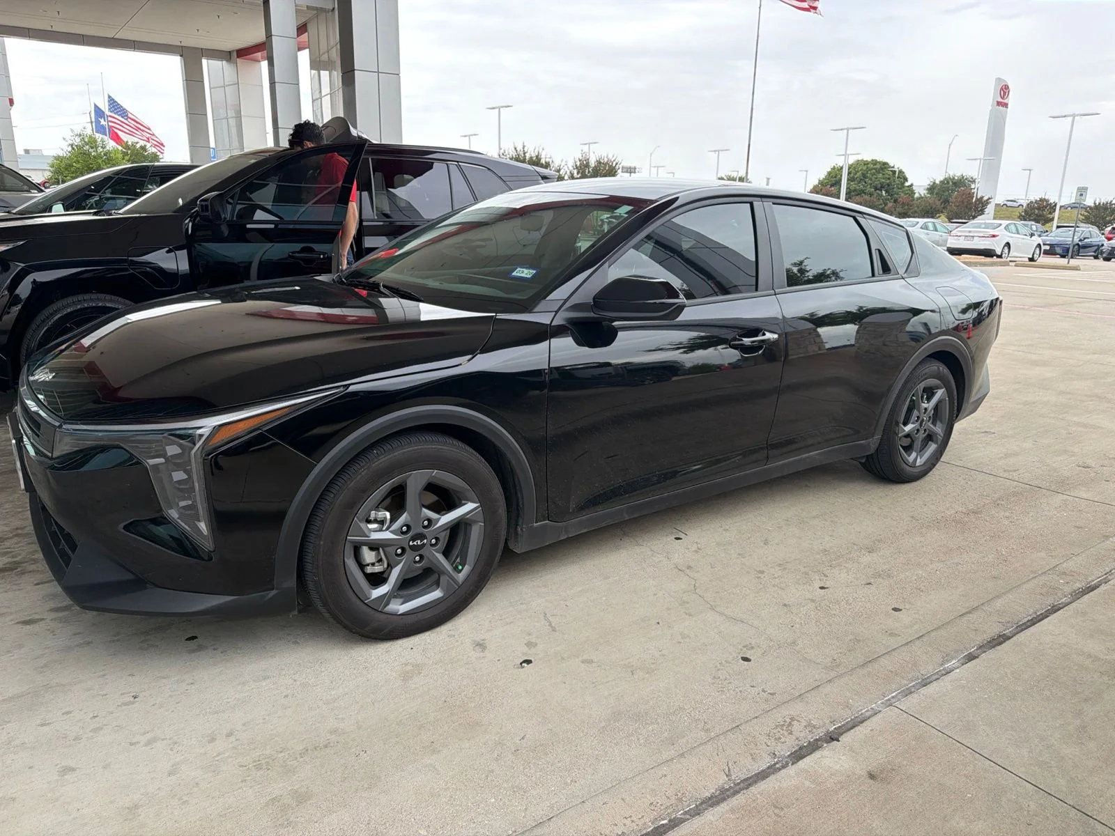 Used 2026 Black Kia LXS image 1