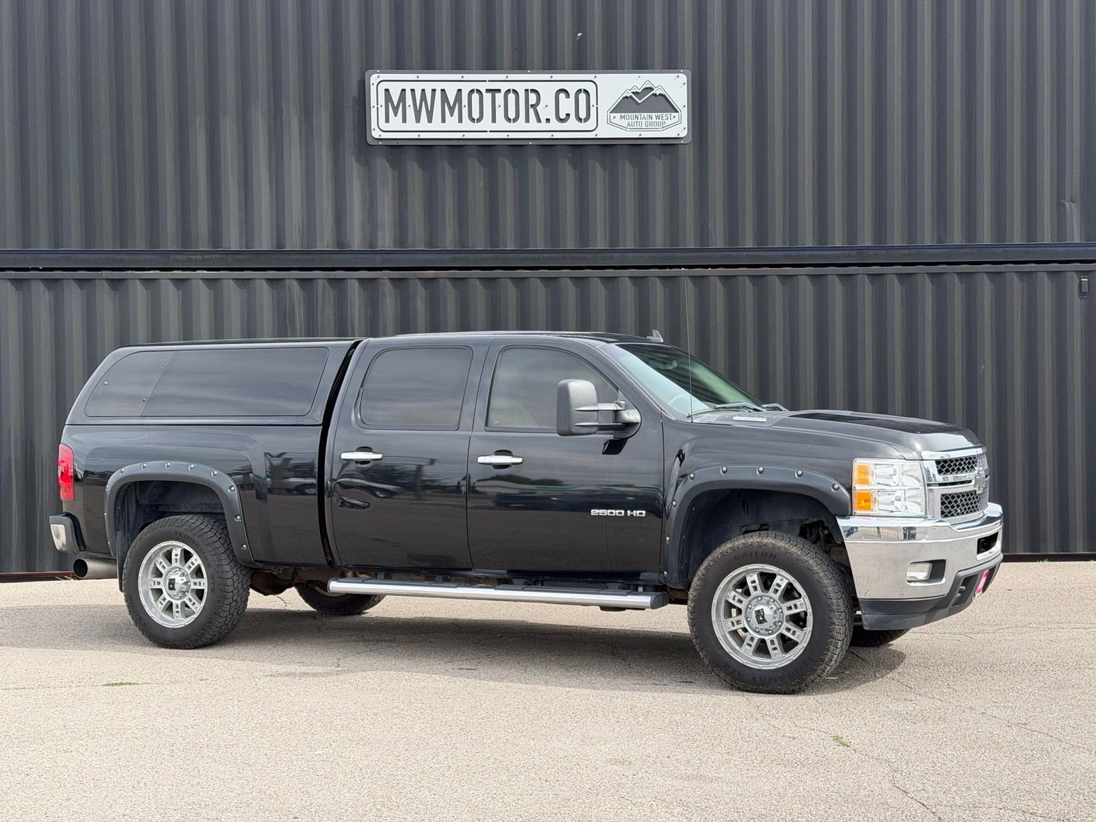 Used 2011 Black Chevrolet LTZ image 1