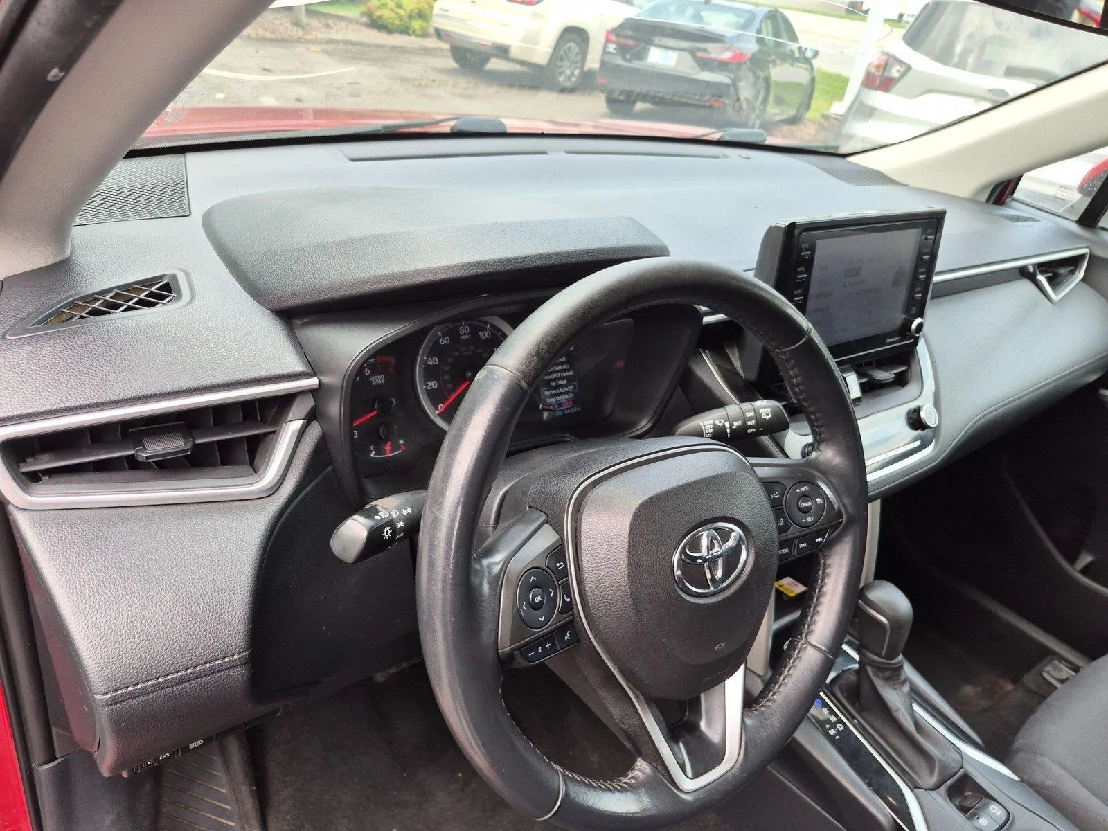 Used 2022 Barcelona Red Metallic Toyota LE image 19