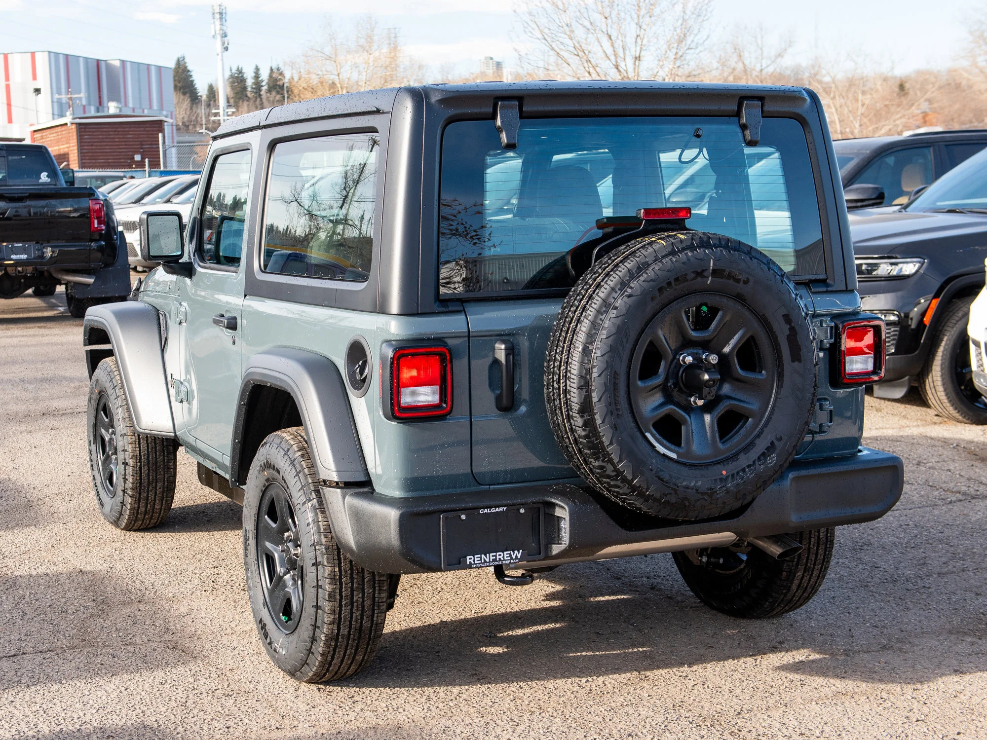 New 2026 Dark blue Jeep Sport* image 3