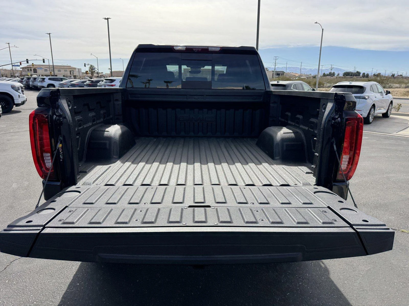 New 2026 TITANIUM RUSH METALLIC GMC AT4X image 12