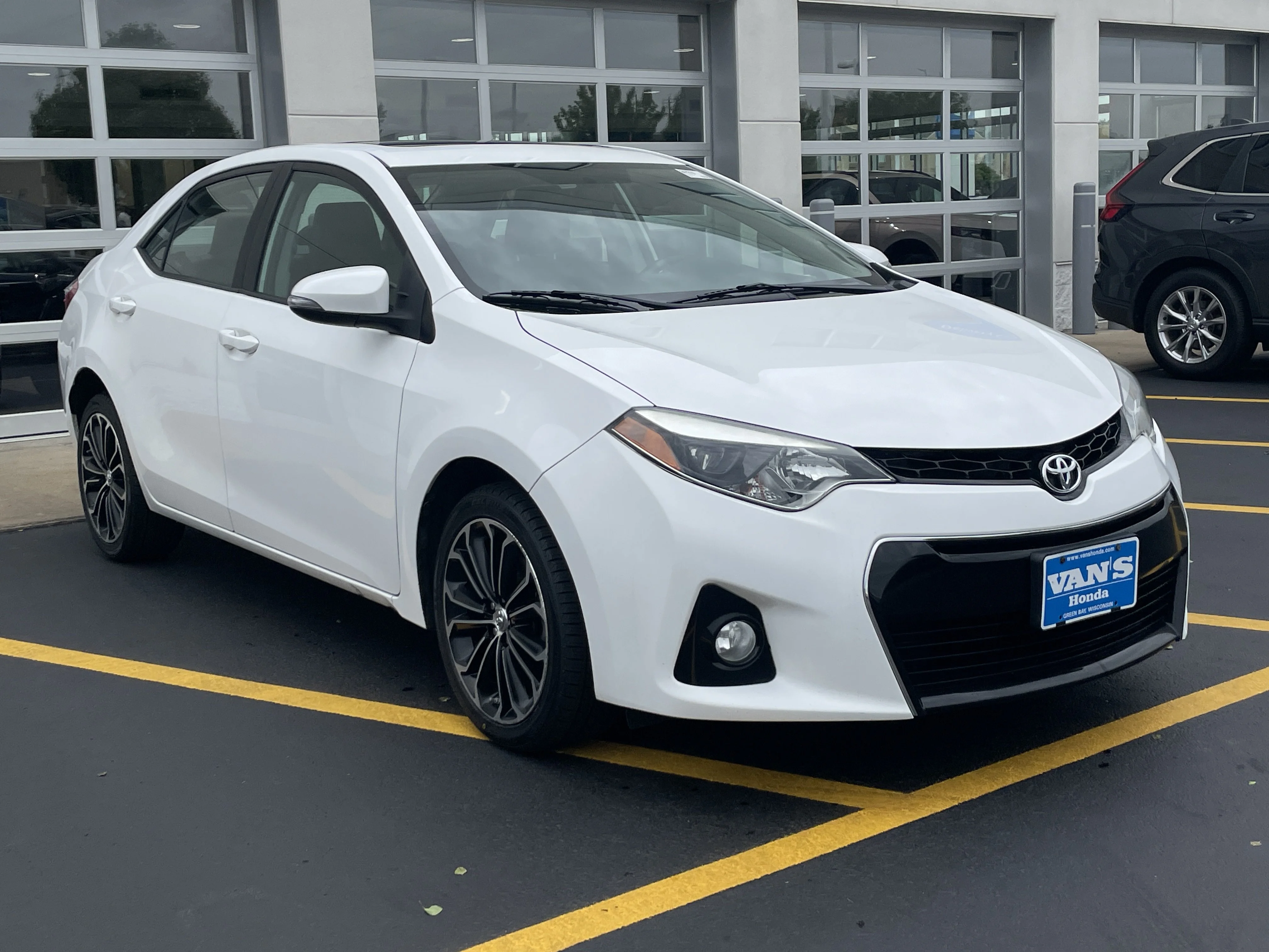 Used 2015 Super White Toyota S Plus image 1