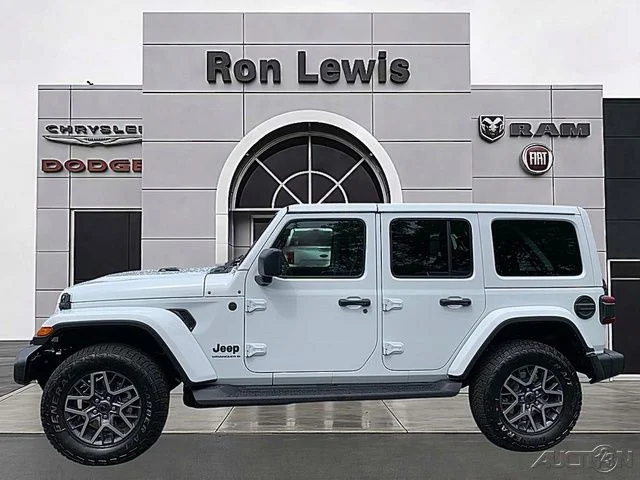 New 2026 Bright White Clearcoat Jeep Sahara image 1