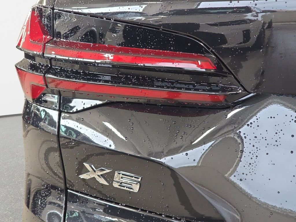 New 2026 Black Sapphire Metallic BMW xDrive50e image 19