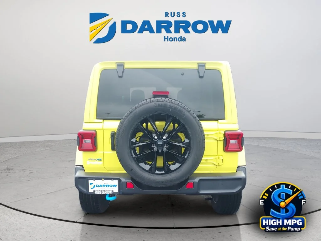 Used 2024 Yellow Jeep Sahara 4xe image 4