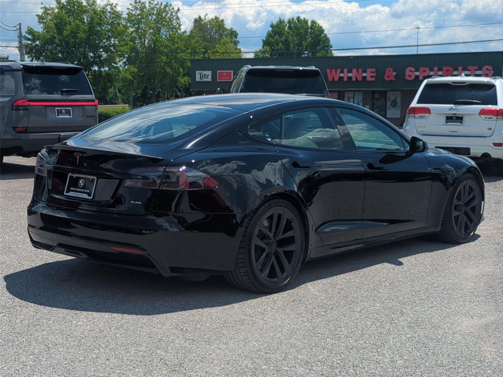 Used 2021 Solid Black Tesla Plaid image 5