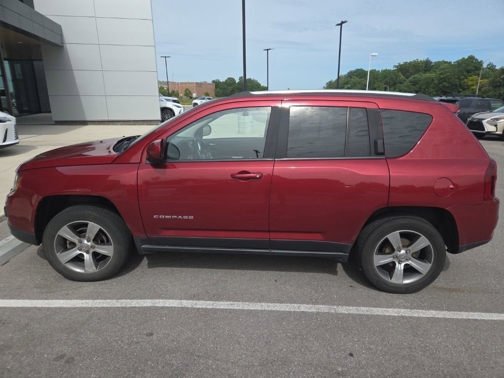 Used 2016 Deep Cherry Red Crystal Pearlcoat Jeep High Altitude Edition image 6