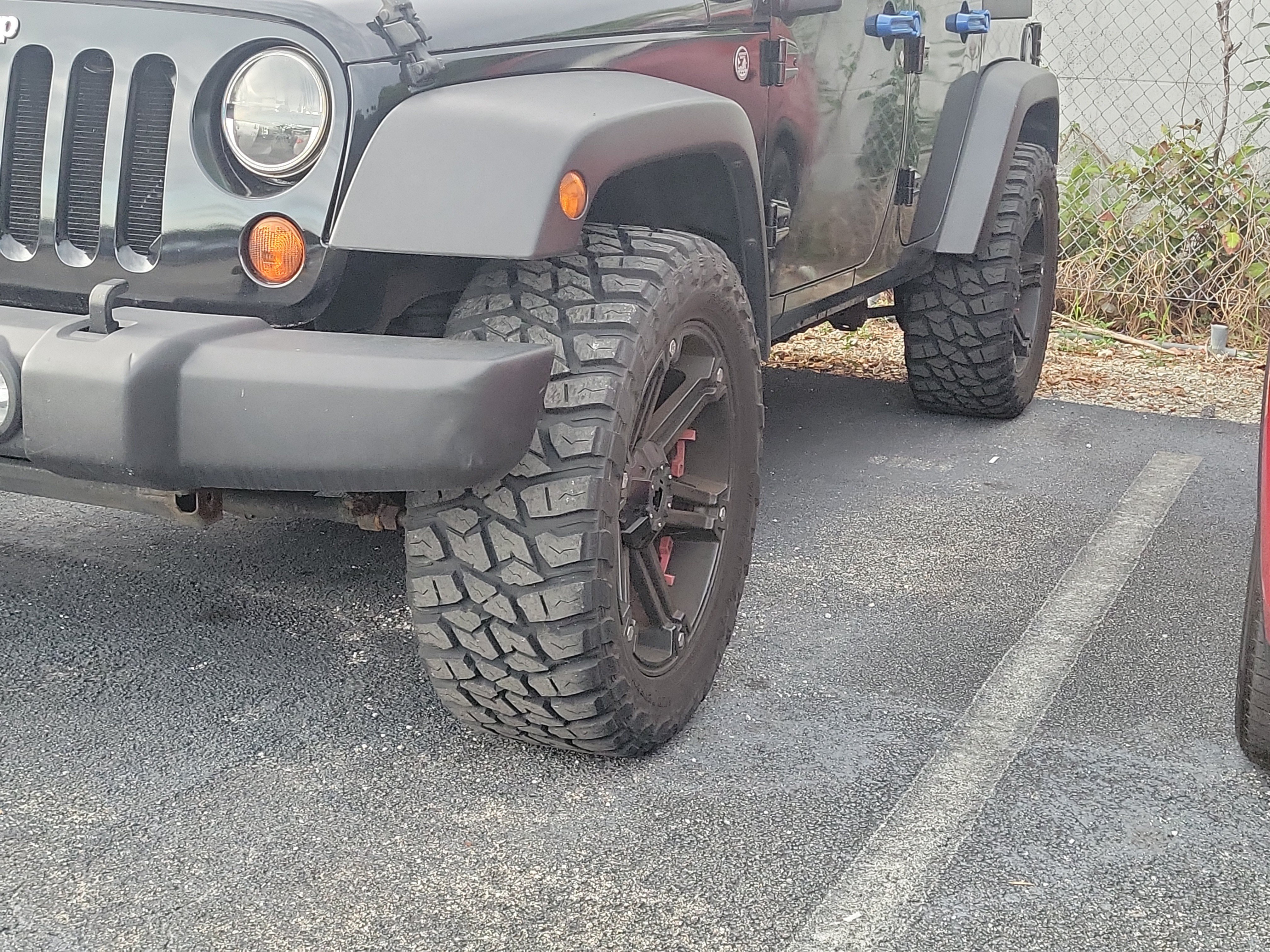 Used 2011 Black ClearCoat Jeep Unlimited Sport image 4