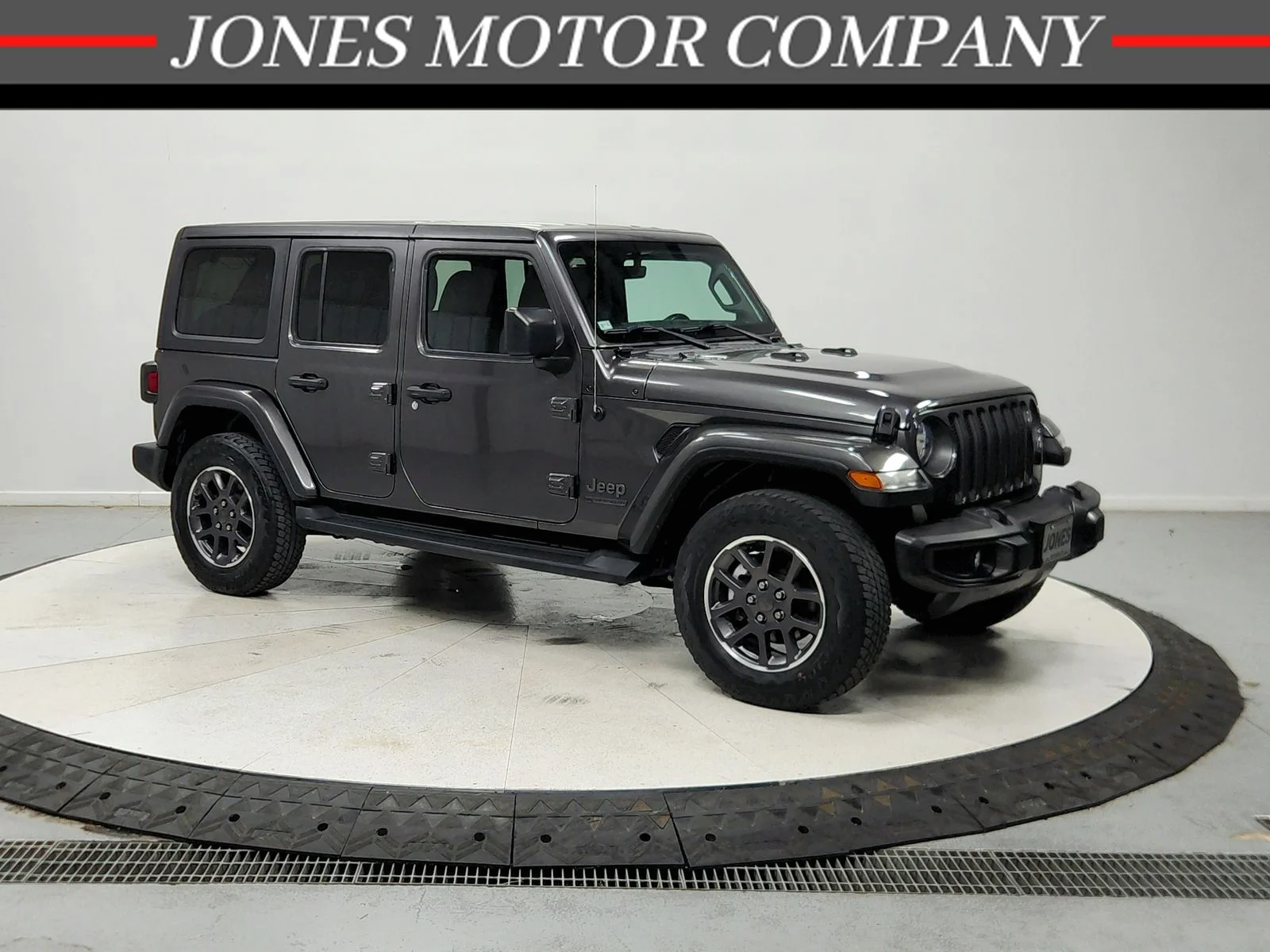 Used 2021 Gray Jeep Unlimited Sport image 1