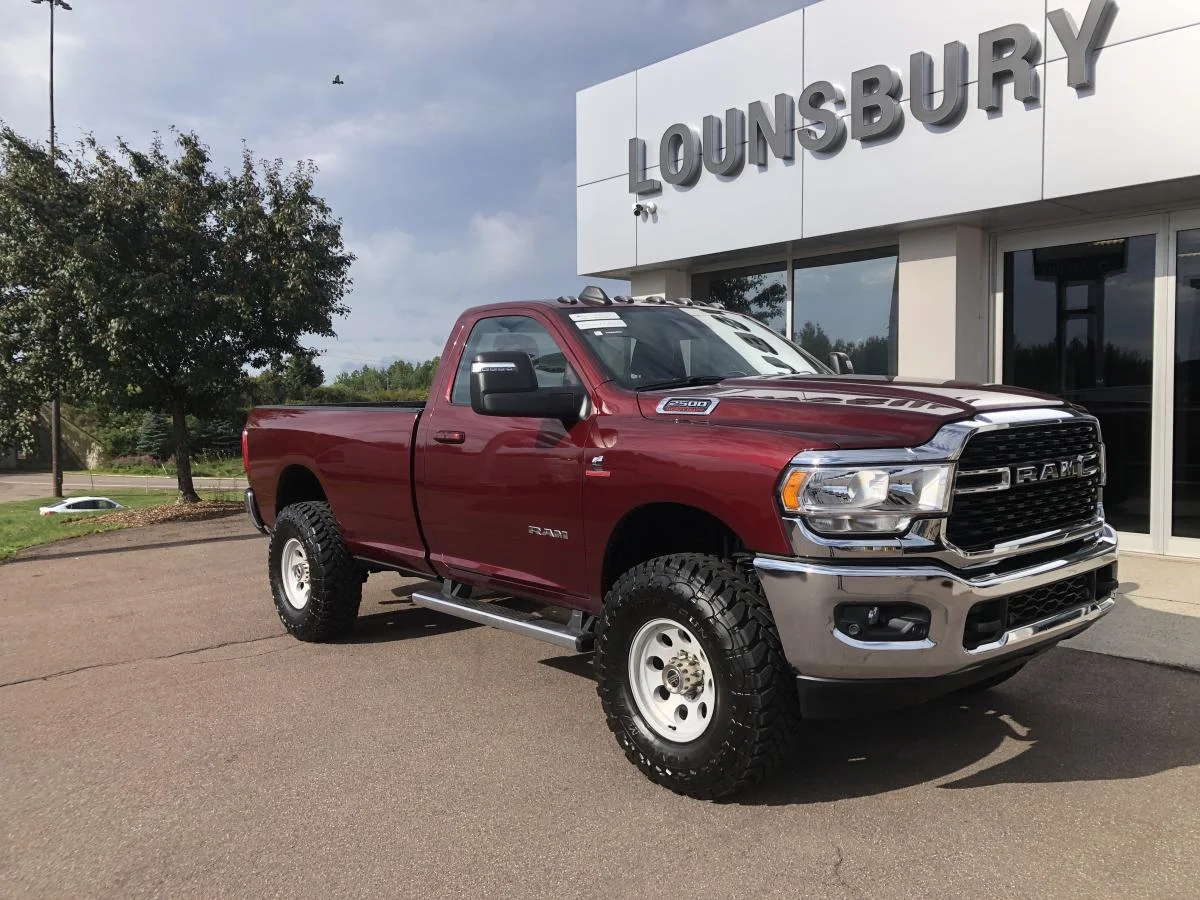 Used 2024 Silver RAM Big Horn 4x4 Reg Cab 8