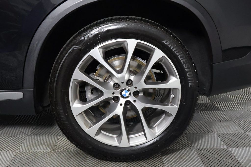 Certified Used 2024 Black Sapphire Metallic BMW sDrive40i image 16