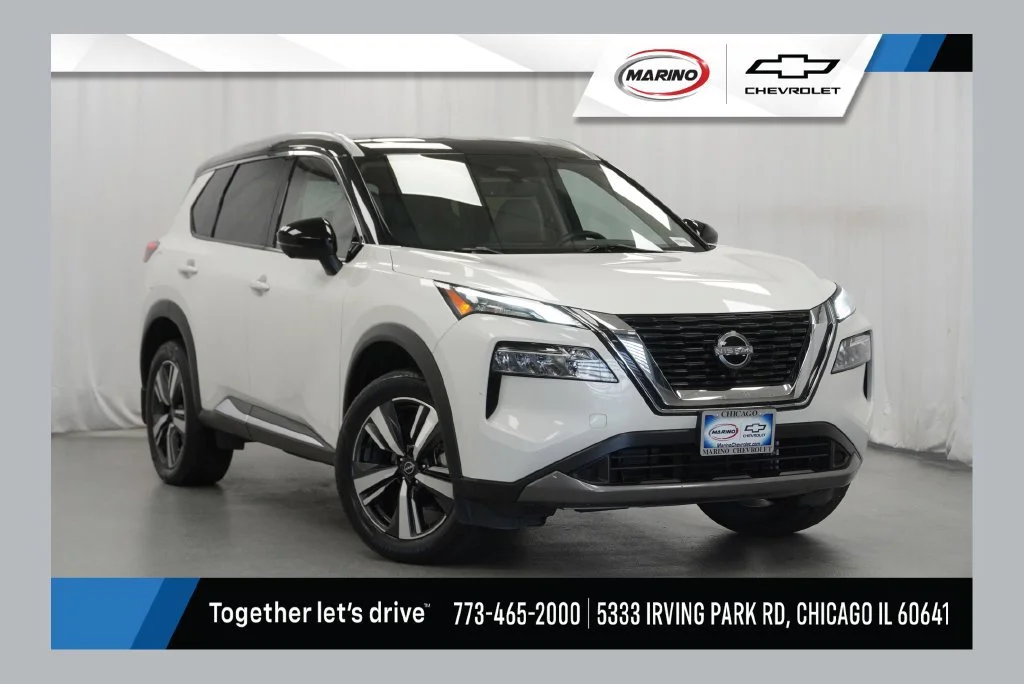 Used 2023 Pearl White Trico Nissan SL image 1
