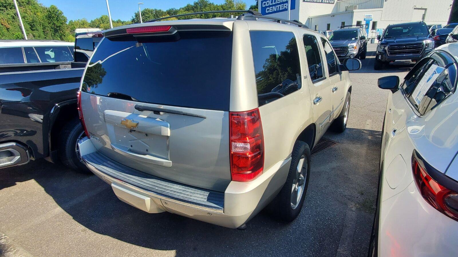 Used 2013 CHAMPAGNE SILVER METALLIC Chevrolet LTZ image 9