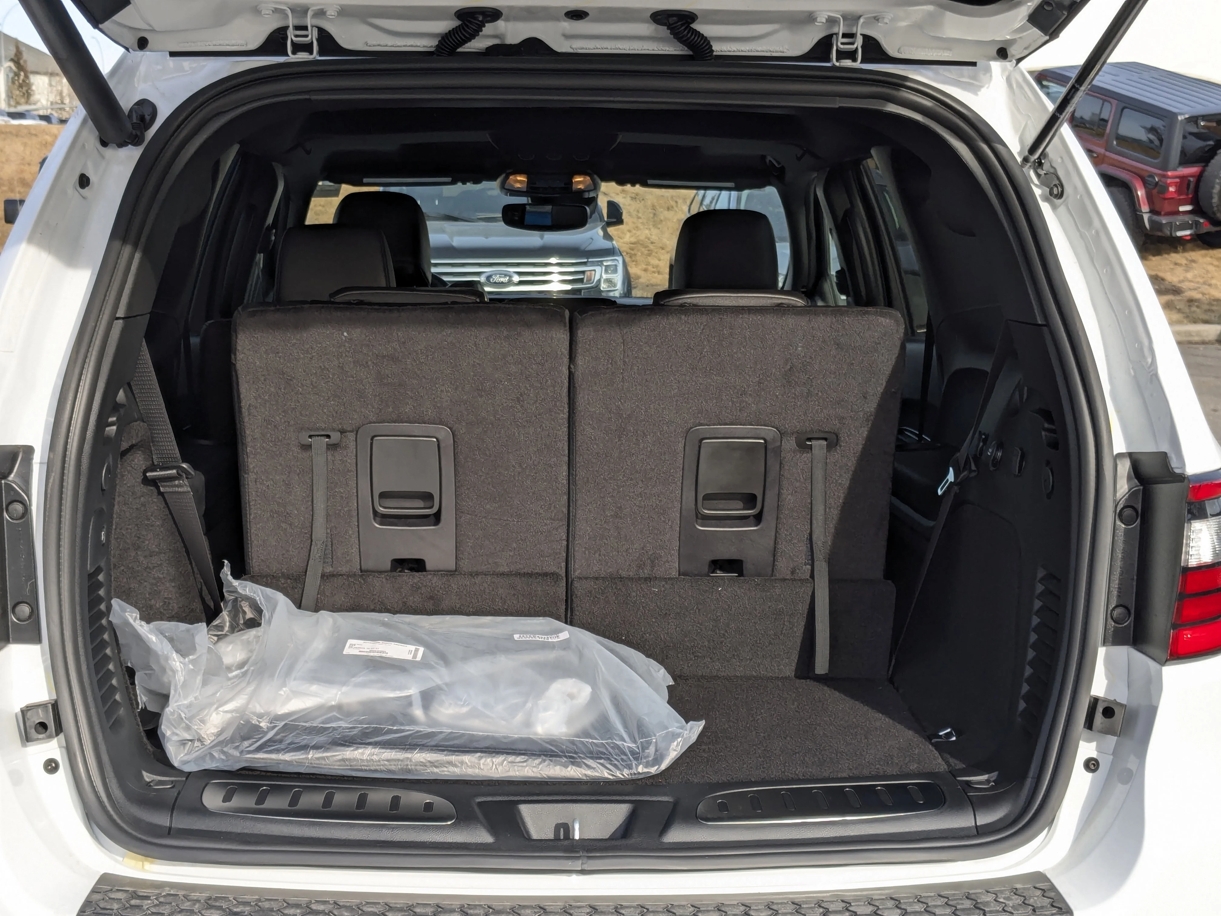 New 2026 White Dodge GT Plus - - GT Plus Pkg (2BH) - 2nd Row Captain Chairs - Ebony Red Leather?Faced Seats - 10.1 Nav & image 31