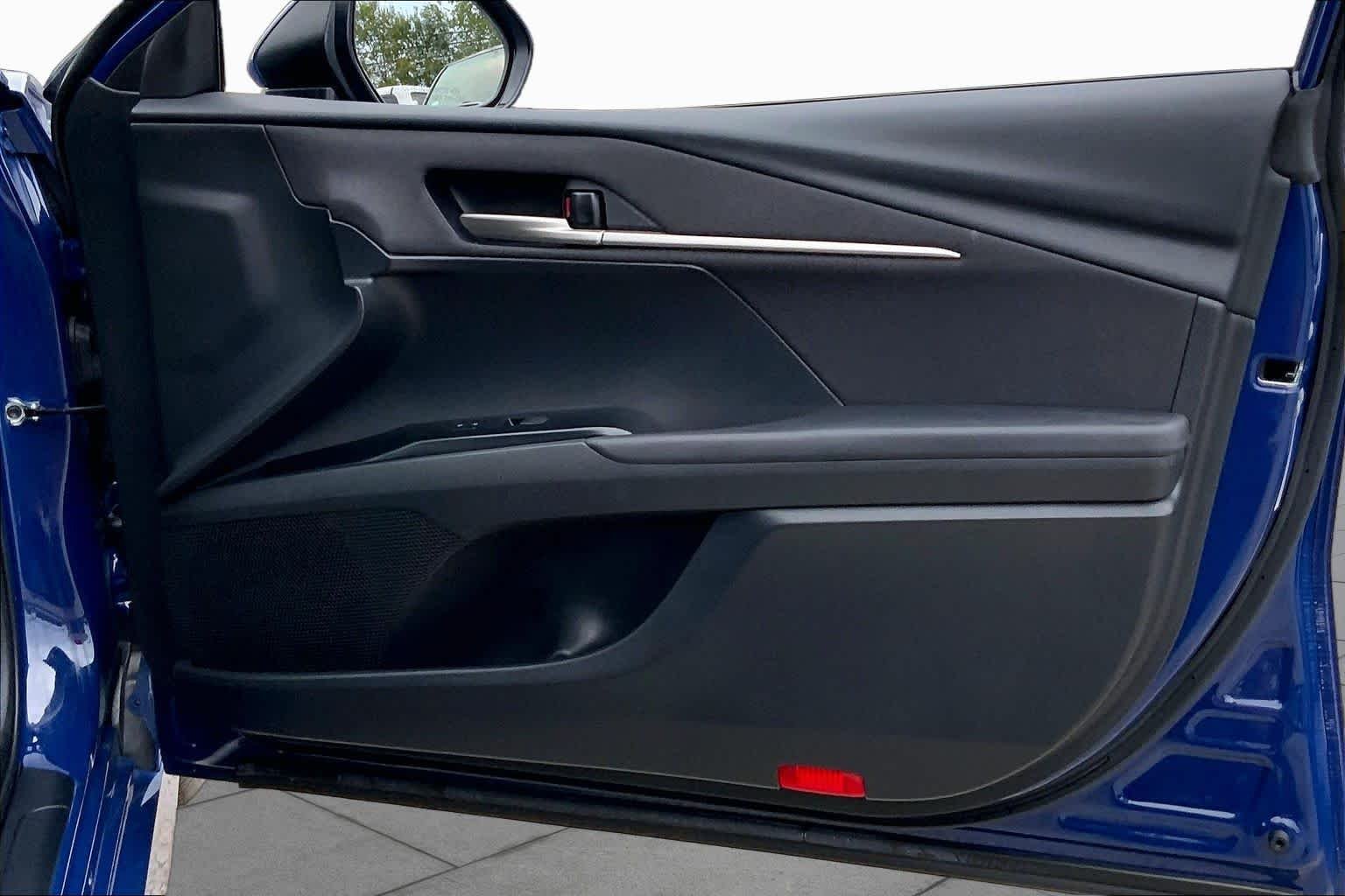 Used 2025 Reservoir Blue Toyota LE image 22