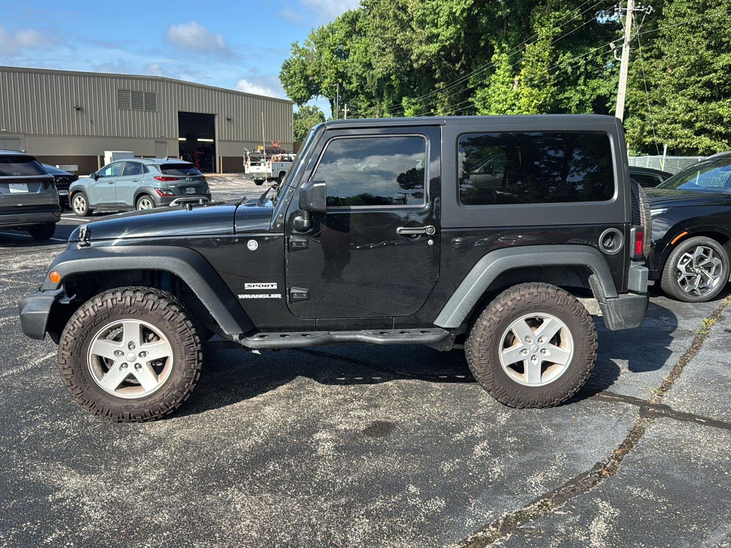 Used 2016 Black Clearcoat Jeep Sport image 6