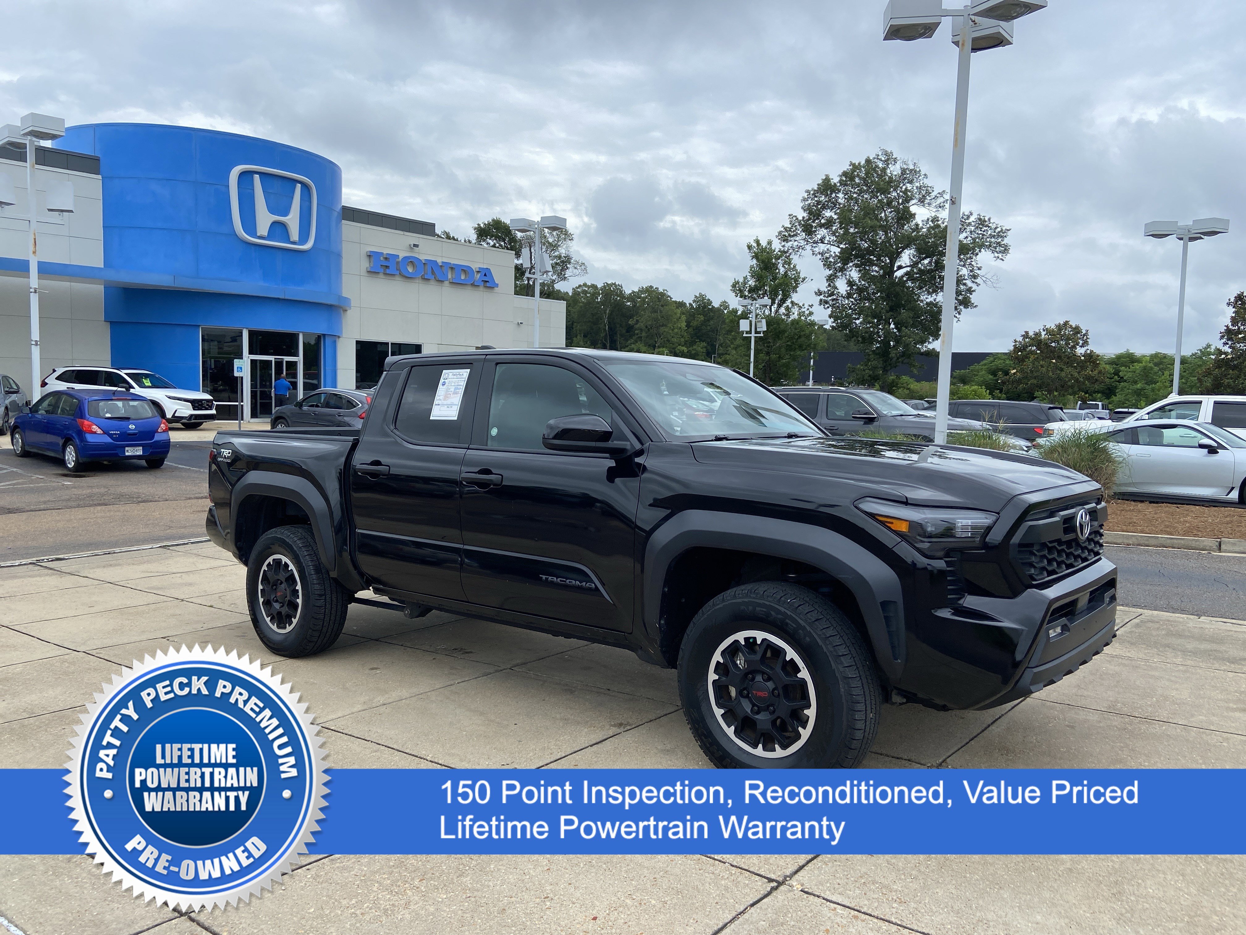 Used 2024 Black Toyota TRD Off Road image 1