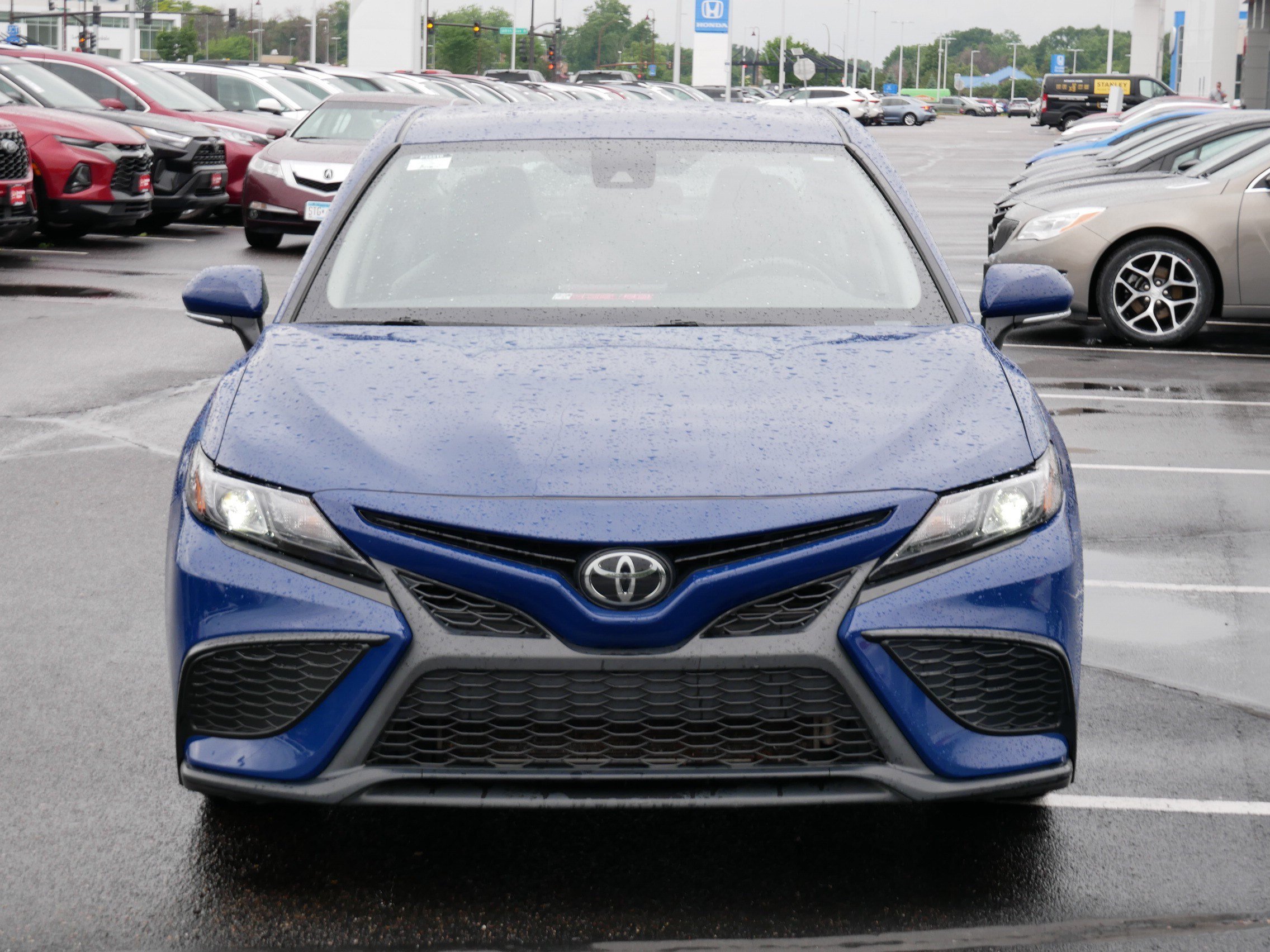 Certified Used 2024 RESERVOIR BLUE Toyota SE image 2