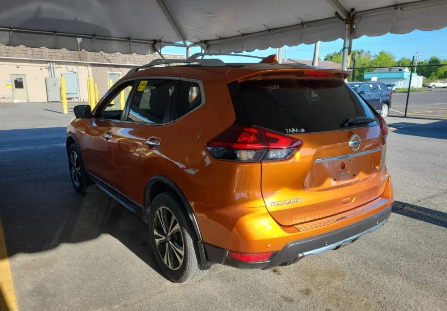 Used 2019 Orange Nissan SV image 3