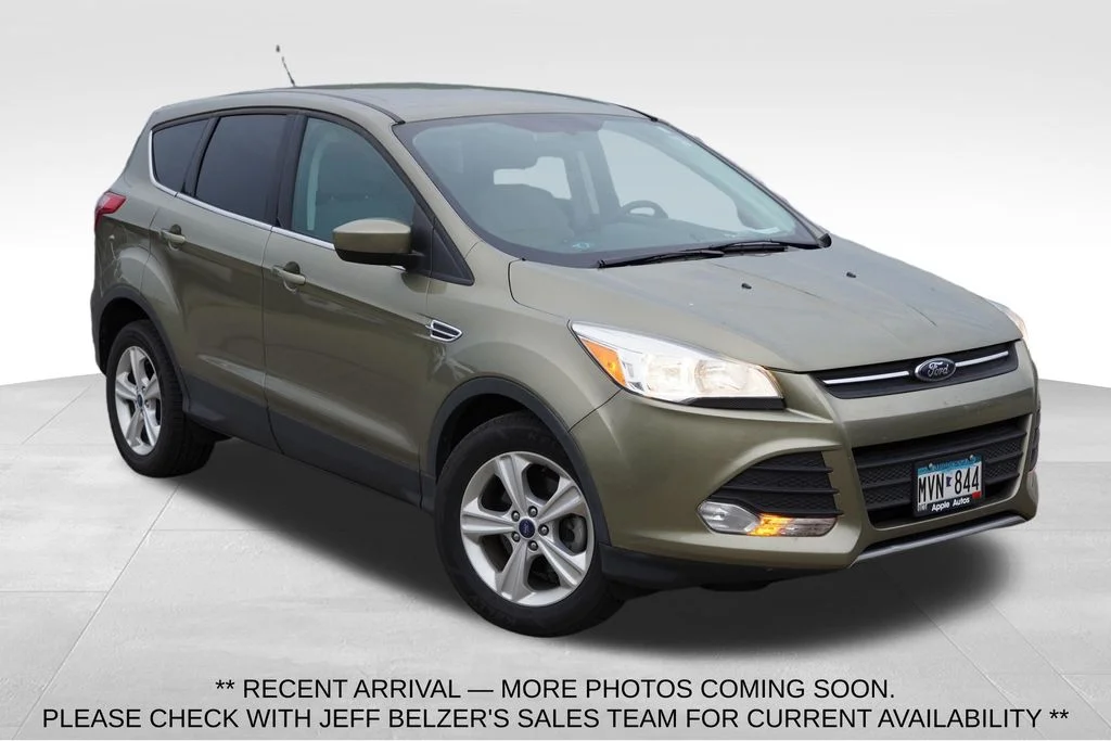 Used 2014 Ginger Ale Metallic Ford SE image 1