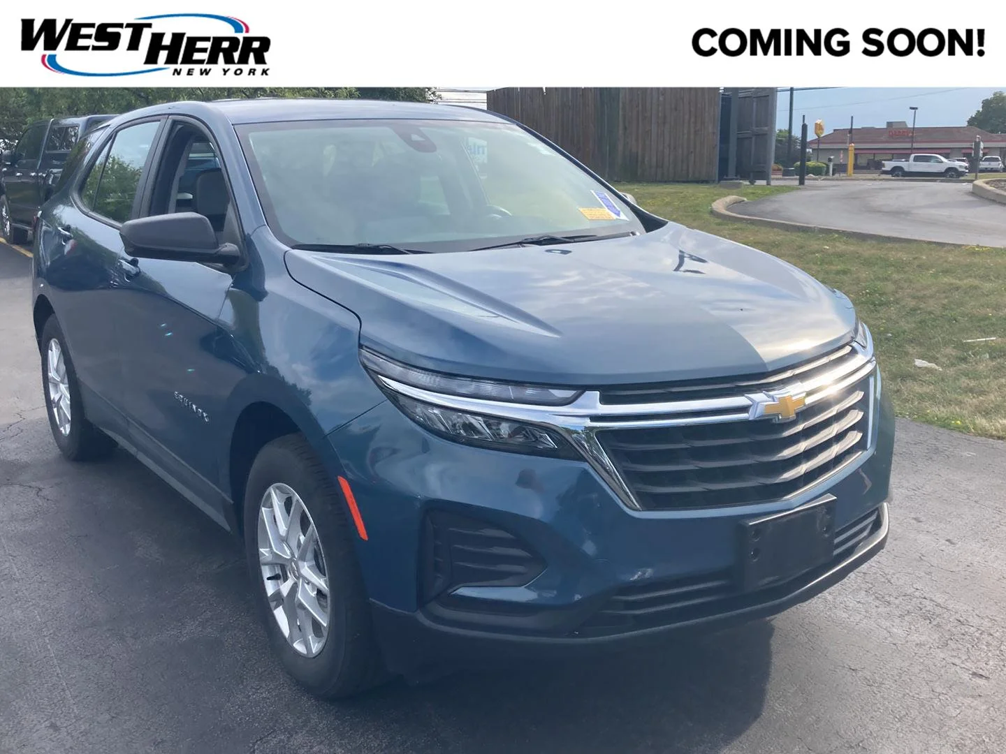Used 2024 Lakeshore Blue Metallic Chevrolet LS image 1