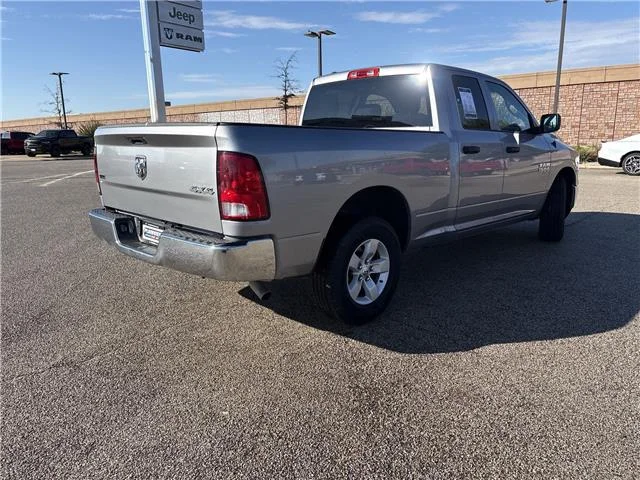 Used 2024 Granite Crystal Metallic Clearcoat RAM SLT 4x4 Quad Cab 6.3 ft. box 140 in. WB image 7