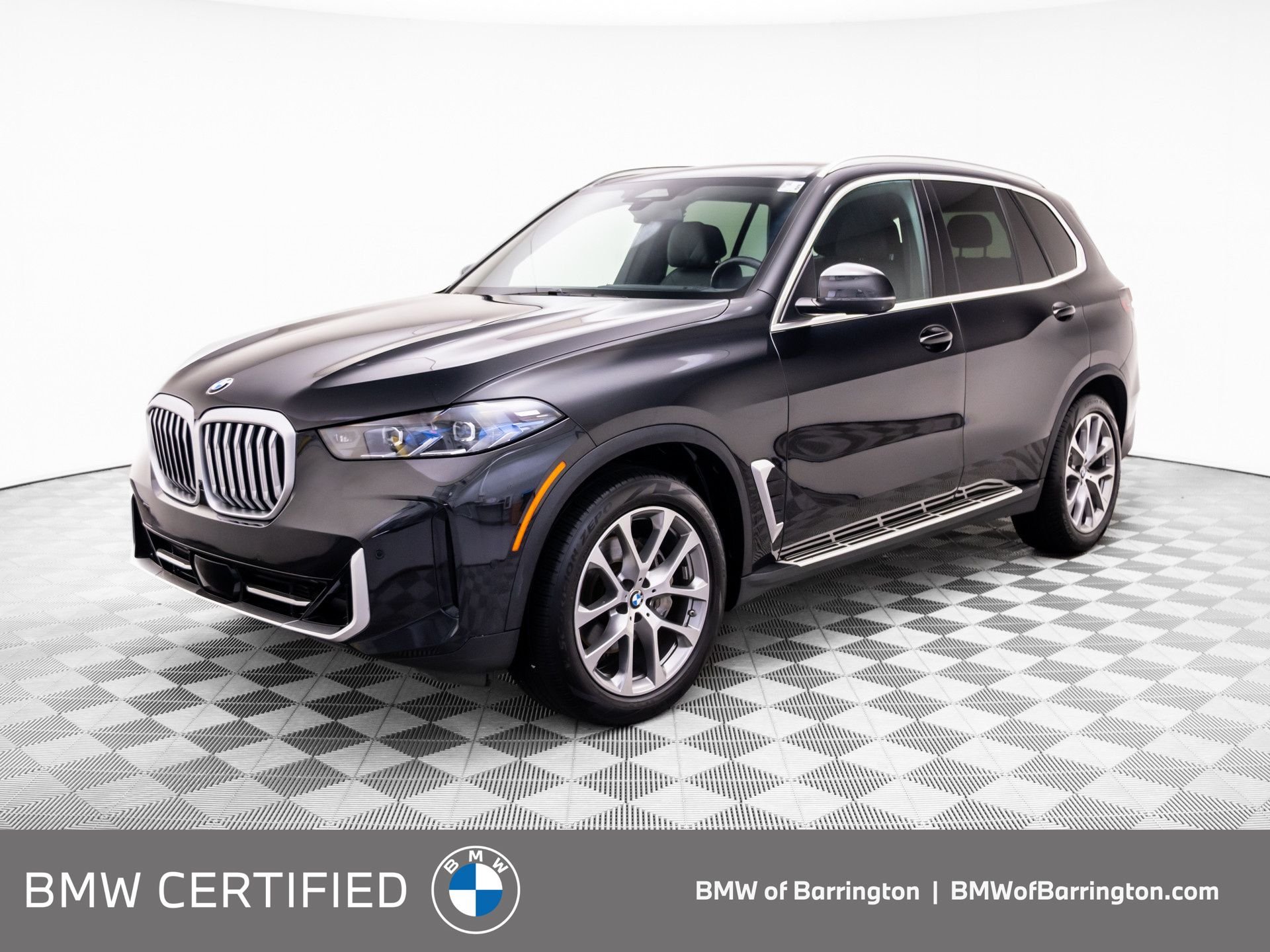 Used 2024 Black BMW xDrive40i image 1