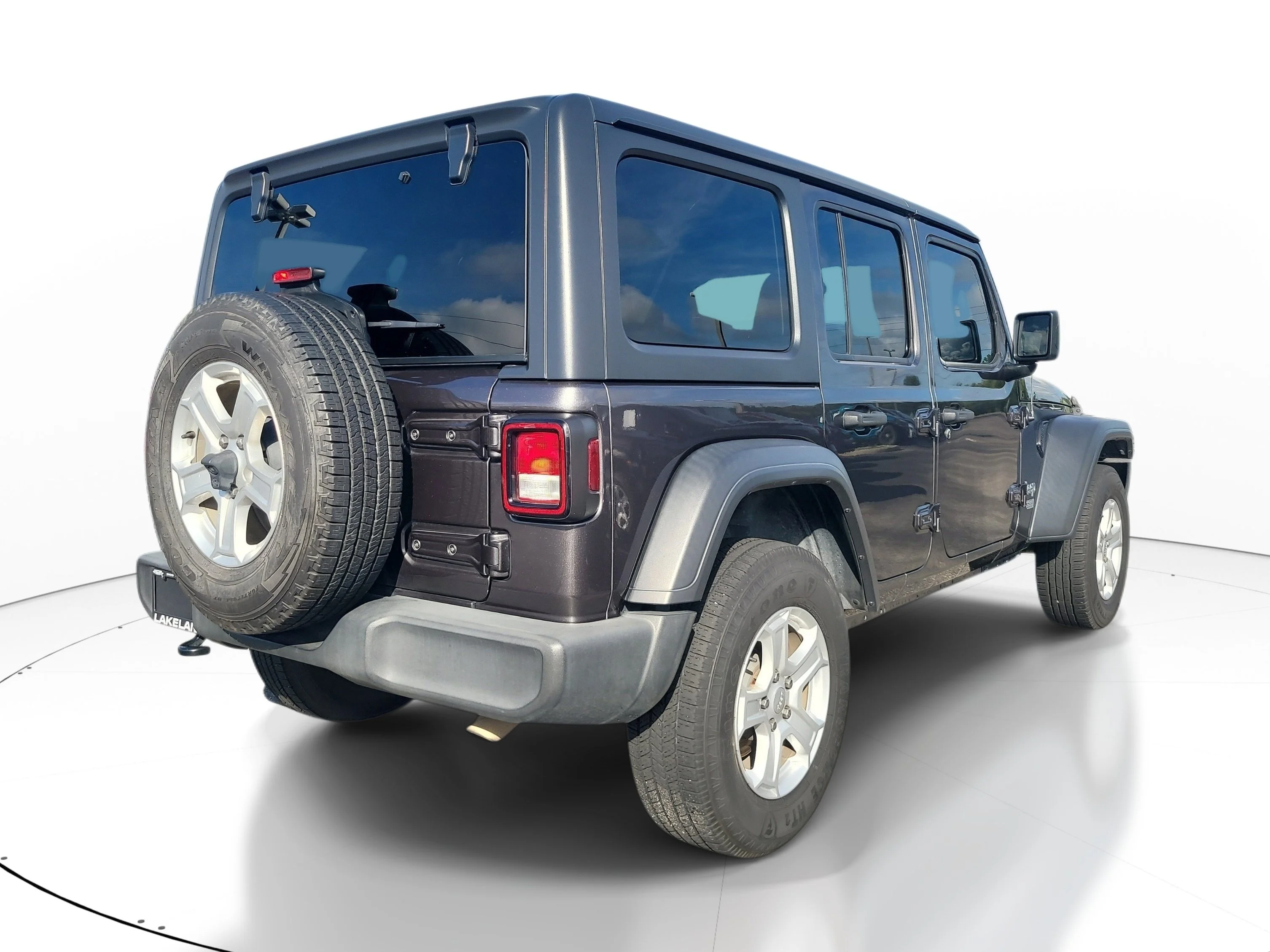 Used 2021 Granite Crystal Metallic Clearcoat Jeep Unlimited Sport S image 4