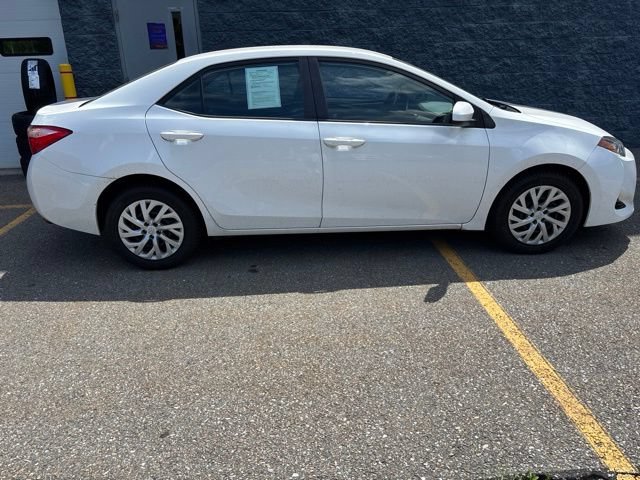 Used 2017 Super White Toyota LE image 4