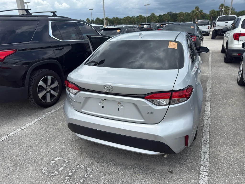 Used 2021 Classic Silver Metallic Toyota LE image 2