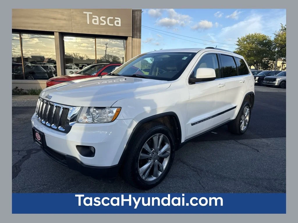 Used 2013 White Jeep Laredo image 1