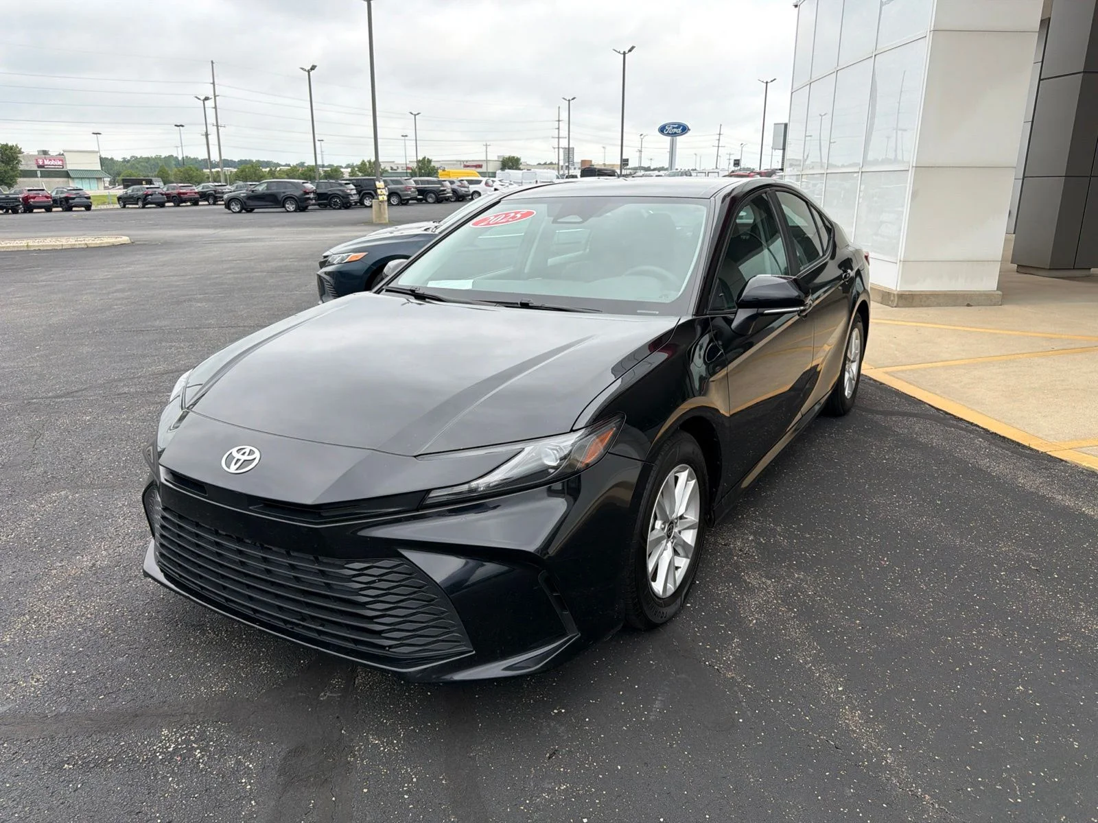 Used 2025 Black Toyota LE image 3