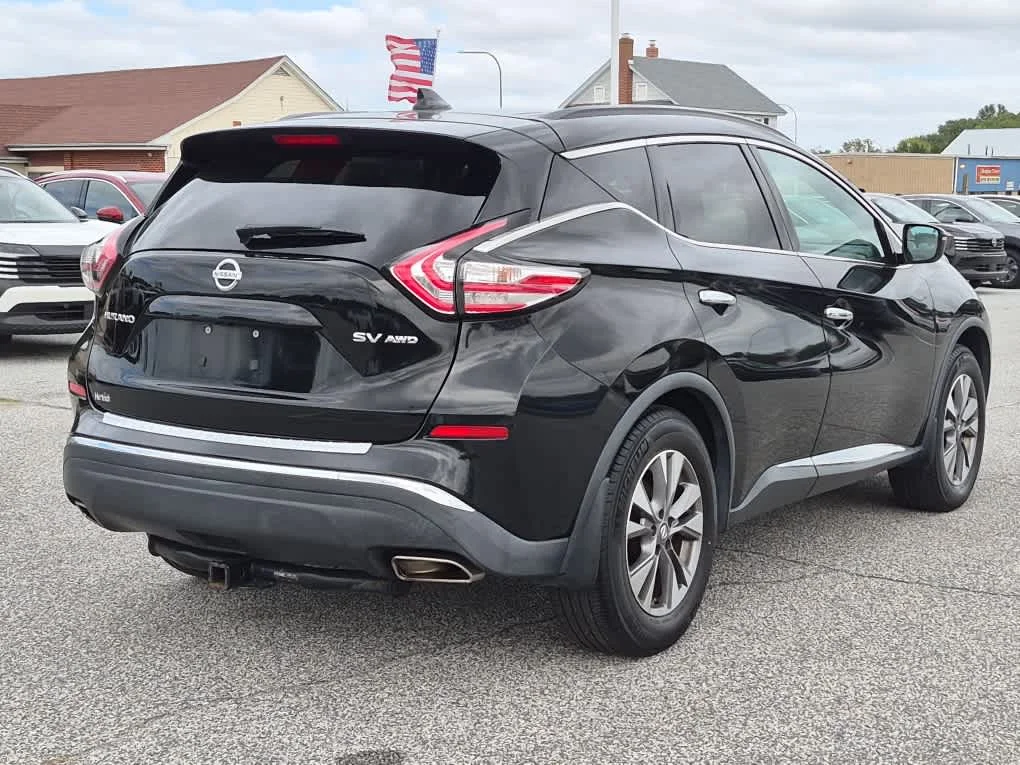 Used 2017 Magnetic Black Metallic Nissan SV image 3