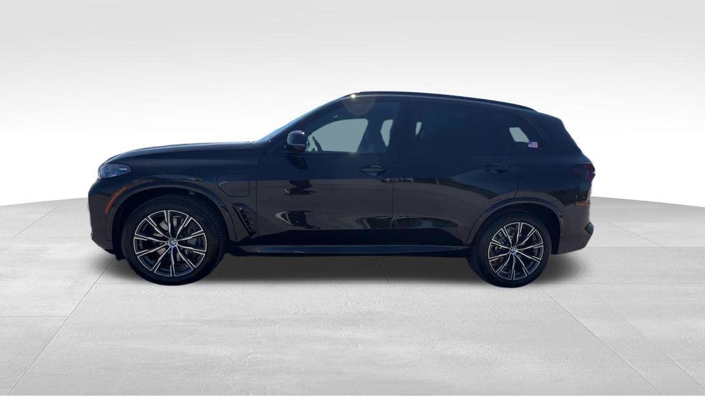 New 2026 Black Sapphire Metallic BMW xDrive50e image 9